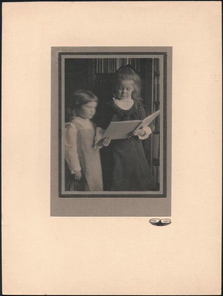 Children Reading a Book