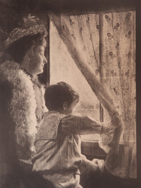 Woman and Child Looking out Window