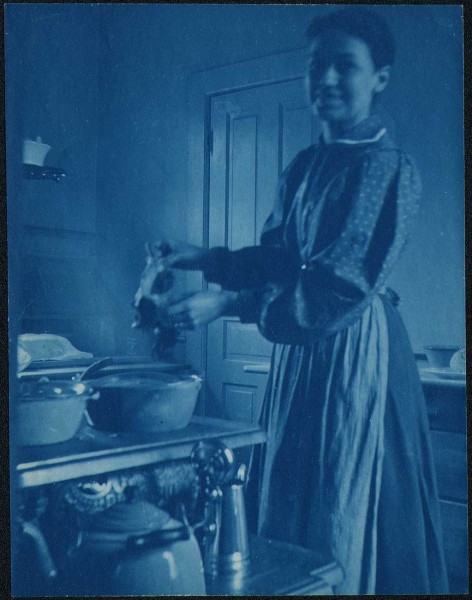 Woman working in Kitchen