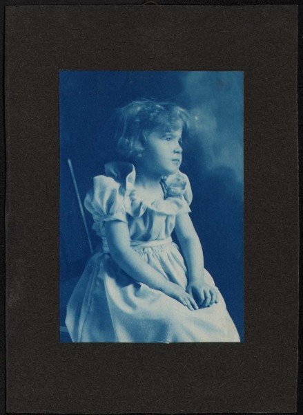Dorothy Tucker Seated Pensively in Chair