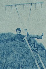 Farmhand atop Salt Marsh Haystack