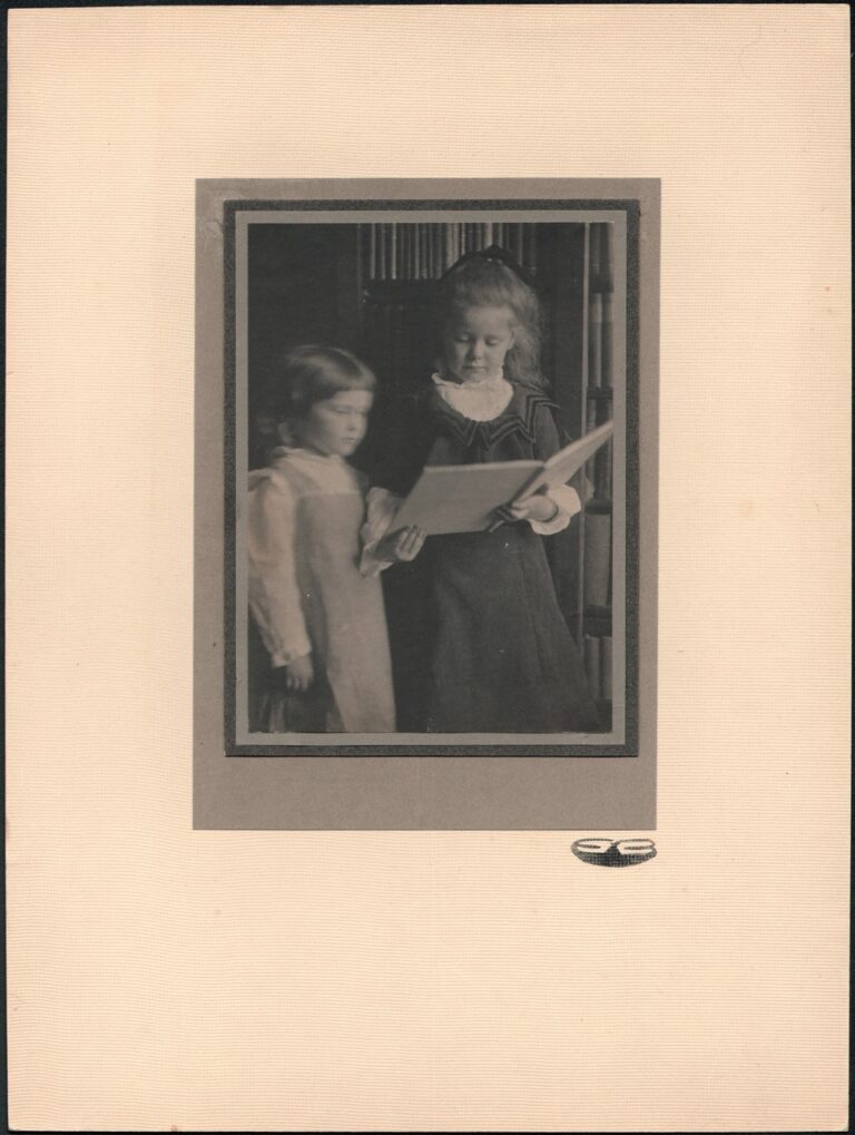 Children Reading a Book