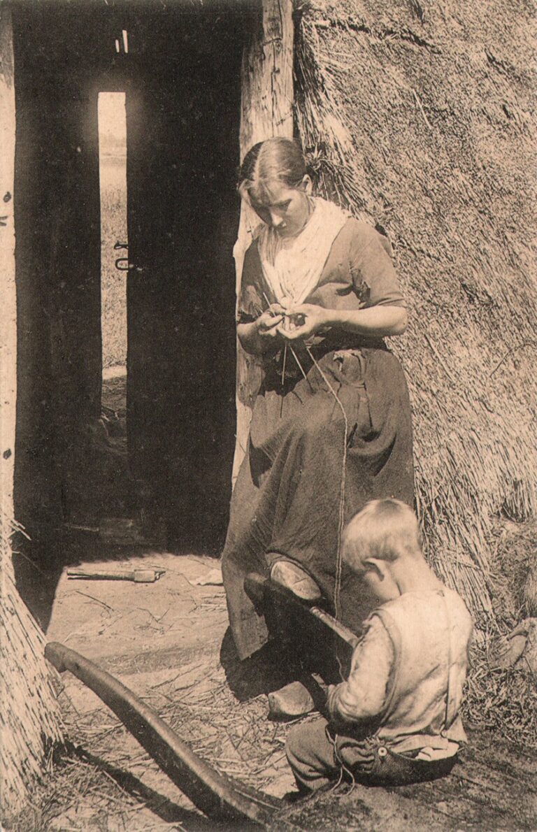 Woman Knitting with Child