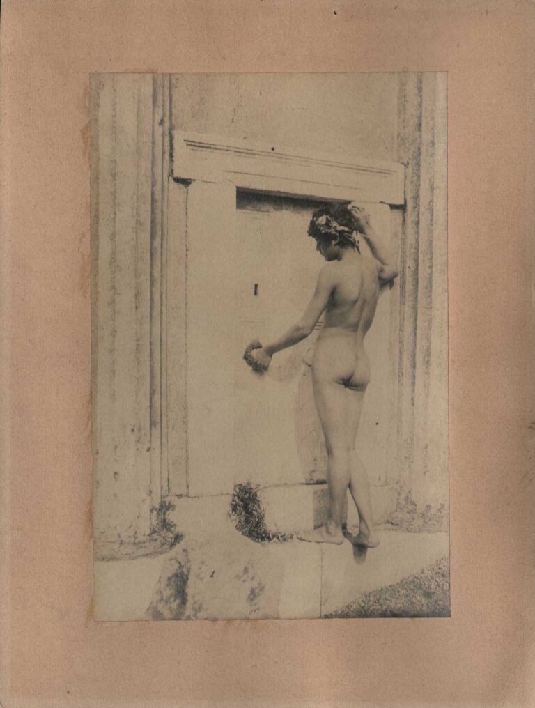Edoardo before a mock-door on an Ancient Roman Grave