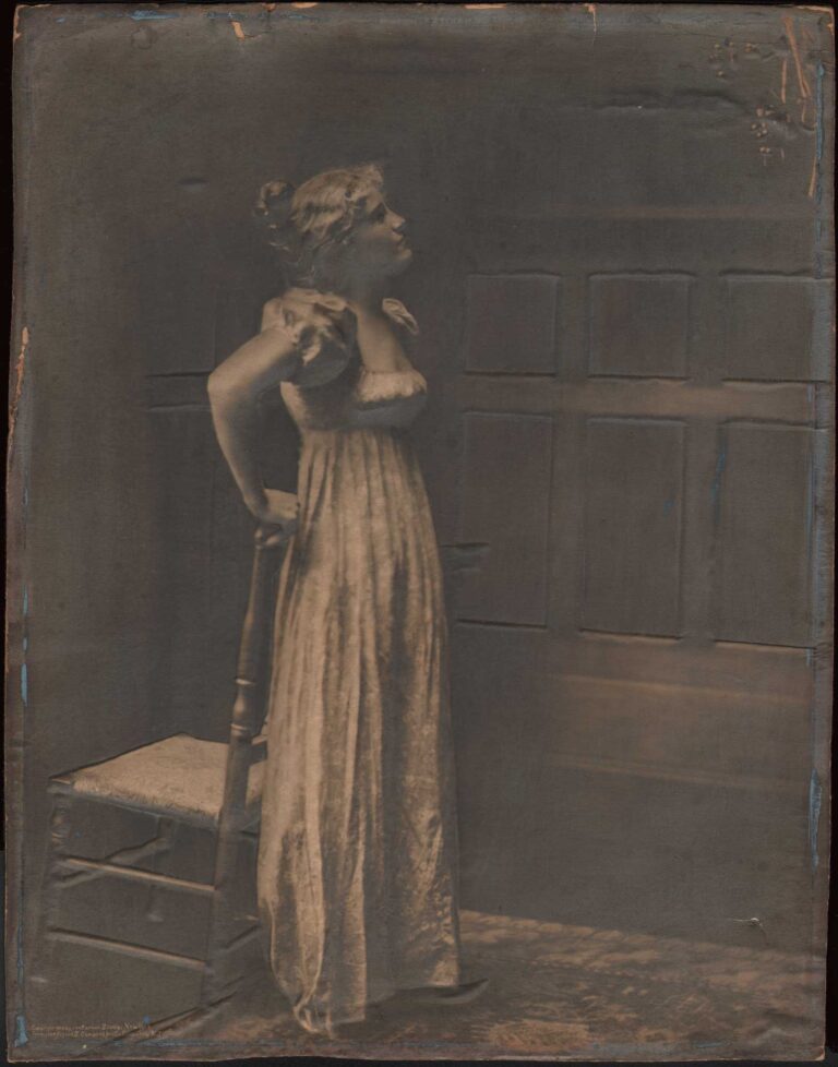 Woman with Back to Chair