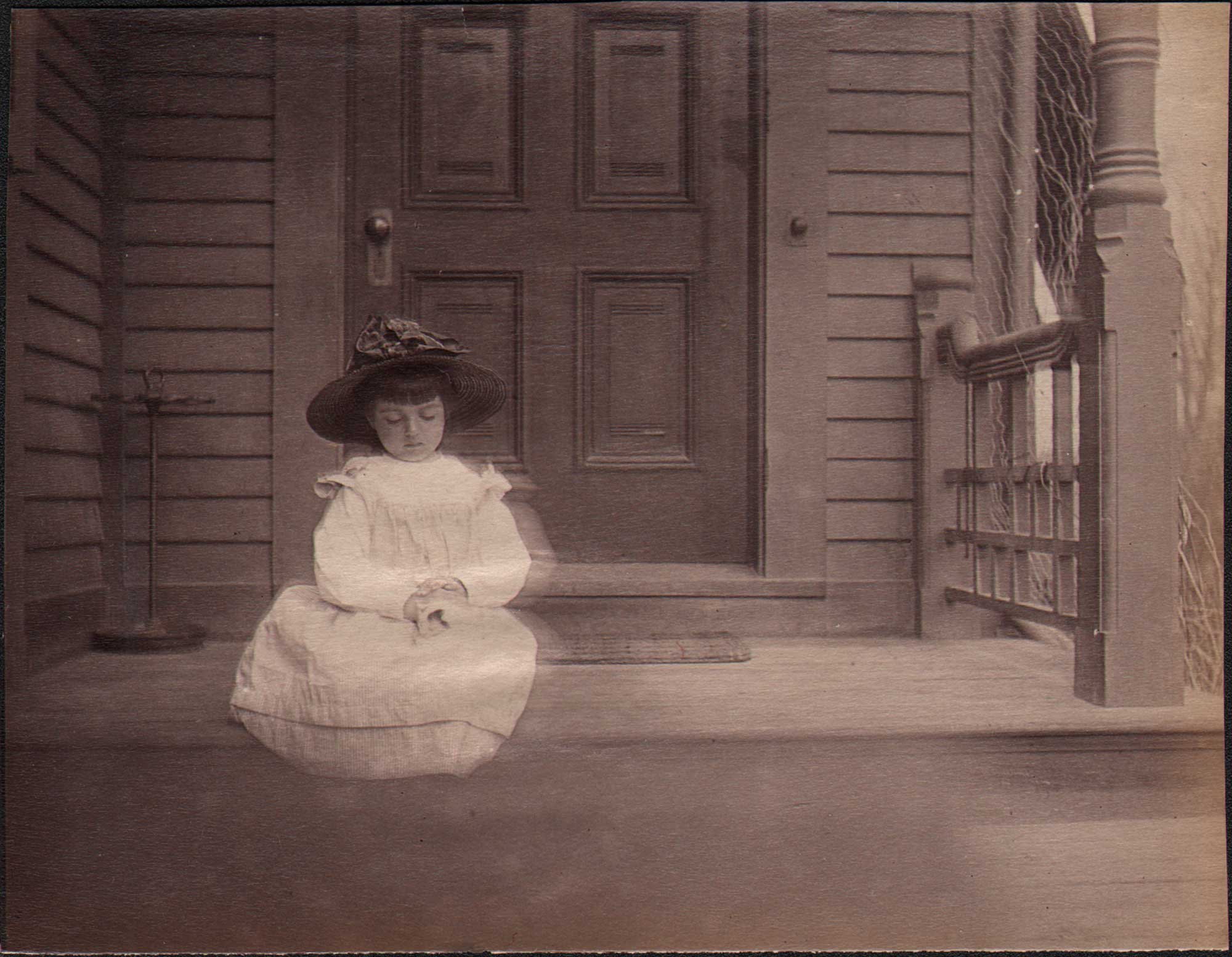 Solitary Child on Porch in Beverly, MA